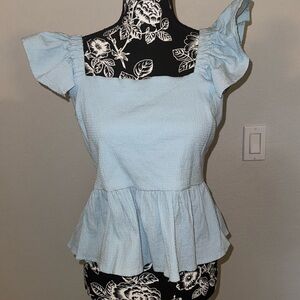 Blue top with open back